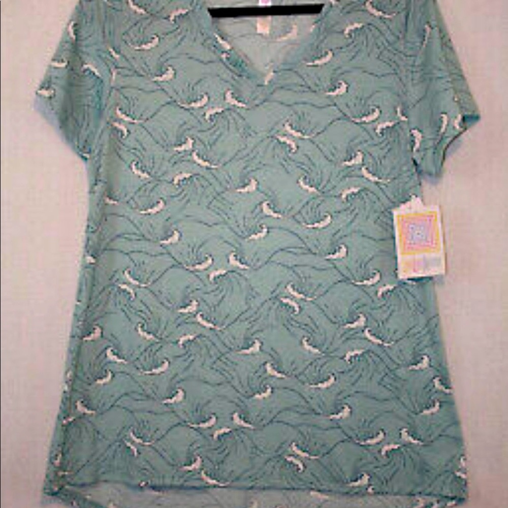 Lularoe light blue waves shirt.